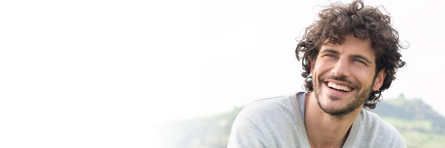 Man smiling after teeth whitening Pikesville MD