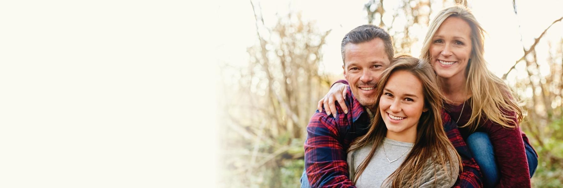 Family smiling after General Dentistry in Pikesville MD