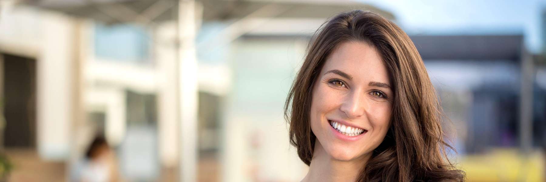 Lady smiling after dental emergency treatment in Pikesville, MD