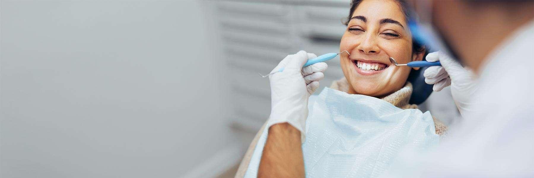 A Patient getting Dental Implants Cost and Financing in Pikesville, MD