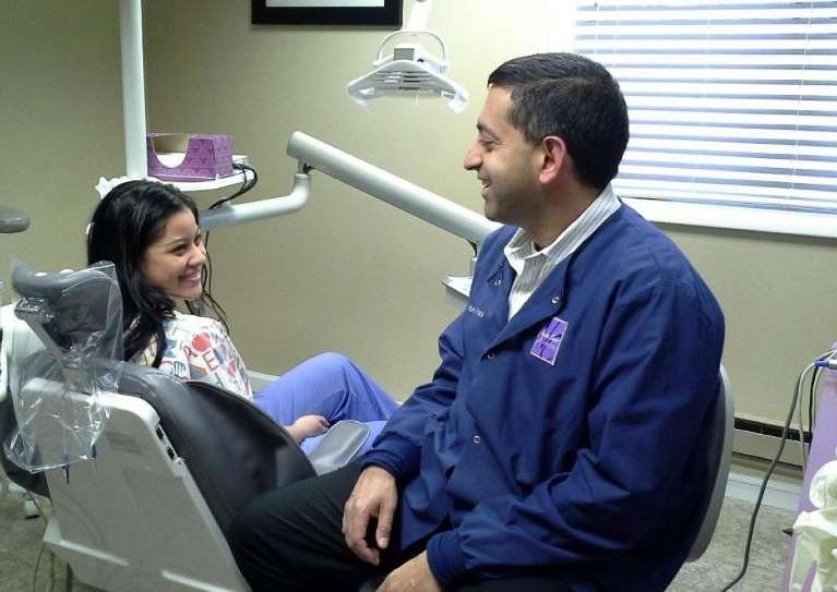 A woman with Dentist in Pikesville, MD