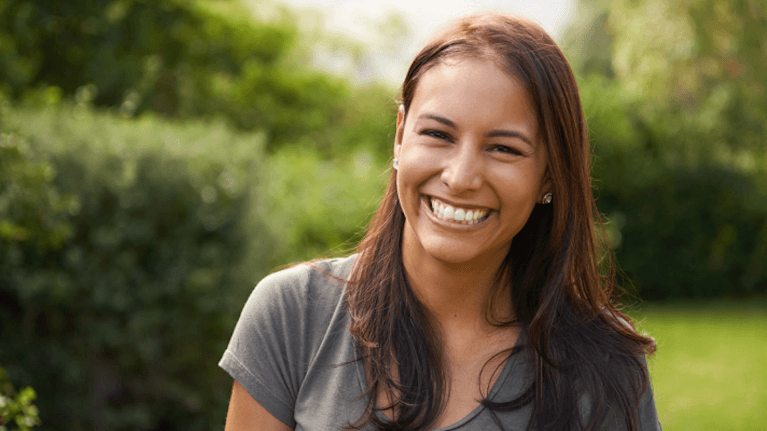 Lady smiling after professional teeth whitening at Naylors Court Dental Partners