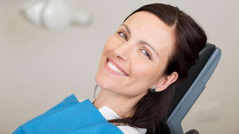 Patient waiting for root canal treatment in Pikesville, MD